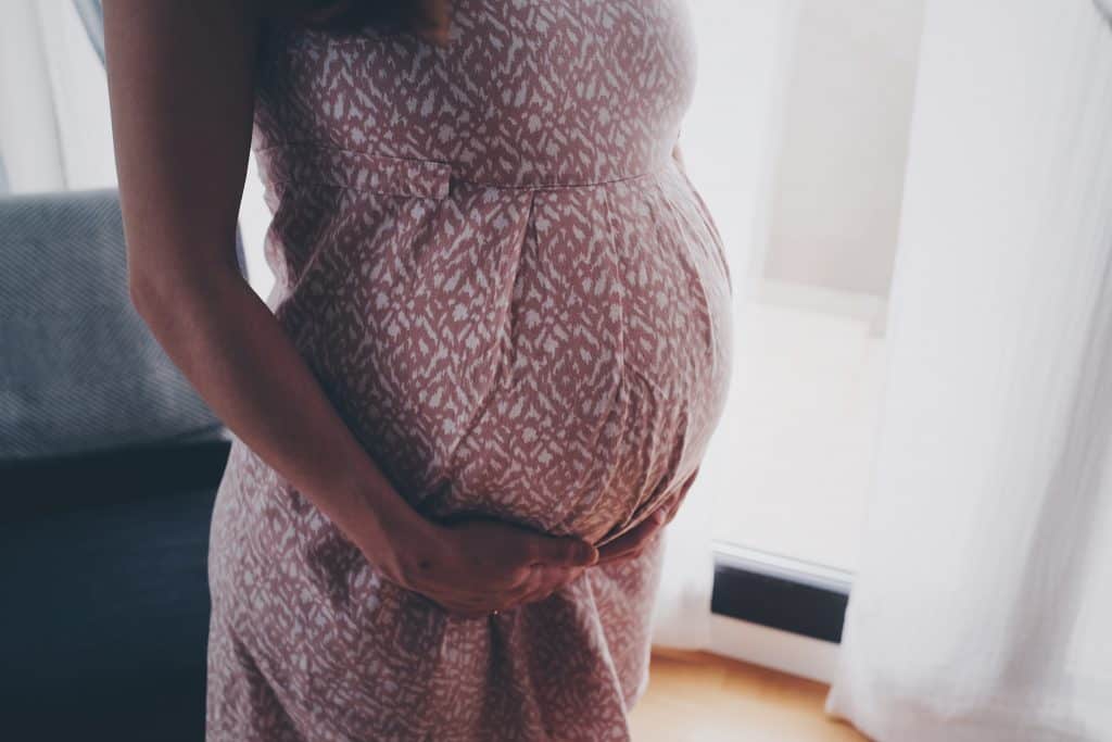 Learn how to deal with anxiety in pregnancy with these 13 natural self-care tips!