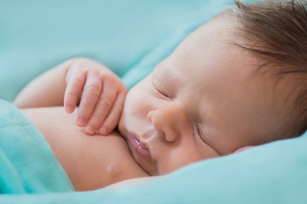 Dream feeding for postpartum recovery