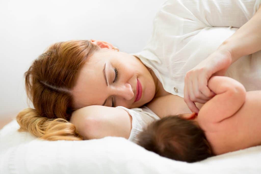 Dream feeding for postpartum recovery